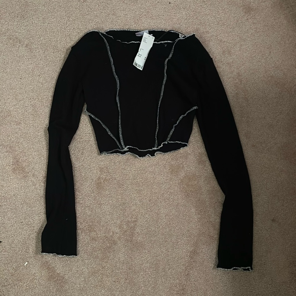 Cropped long sleeve out from under shirt